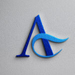 Aliefs Logo: γράμμα A με κυματιστό σχήμα γαρίδας σε μπλε τόνους, σχεδιασμένο από την OCTO.